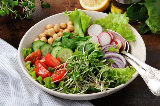 A beautiful Mediterranean salad of delicate leaves of lettuce and spinach, with the addition of Nuta, slices of fresh radish, tomato, cucumber and microsegment of radish. This is the perfect dish for those who are watching their health.