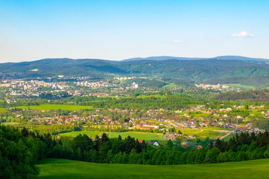 Liberec City Panorama with Jizera Mountains on the background, Czech Republic. Sunny spring day.