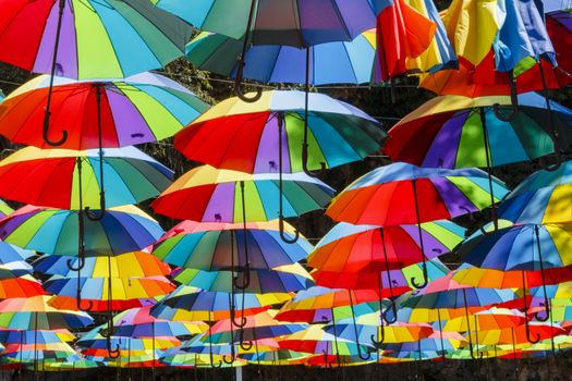 Umbrellas falling from the sky