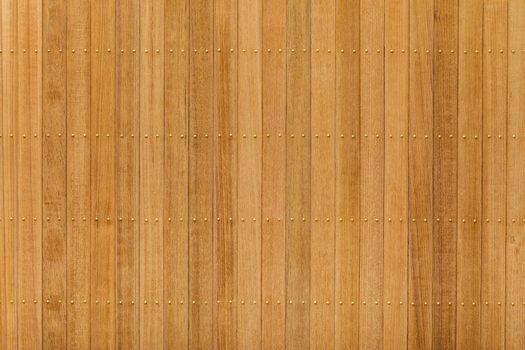Close up teak wood panel floor wall with brass nail