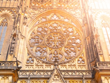 Detailed view on gothic rose window of St. Vitus Cathedral in Prague, Czech Republic.