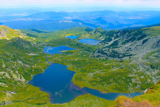 Panorama of mountain lakes in the spring