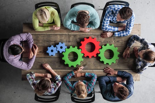 Business people with colorful cogs of business, problem sloution concept