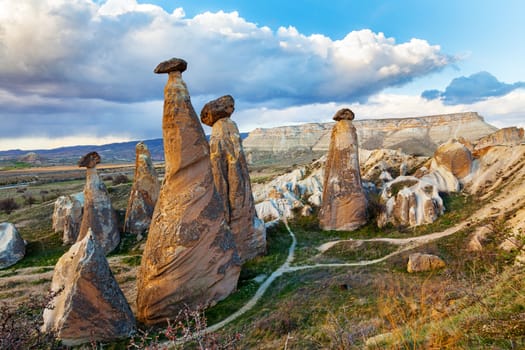 Stone cliffs looks like Fairy houses in Cavusin near Goreme, Cappadocia, Turkey