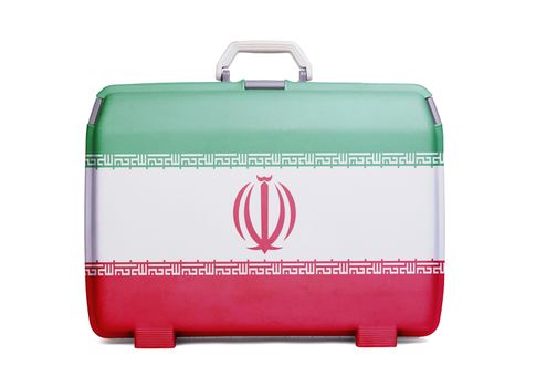 Used plastic suitcase with stains and scratches, printed with flag, Iran