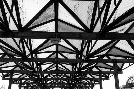 glass windows of a greenhouse style coach station in lisbon