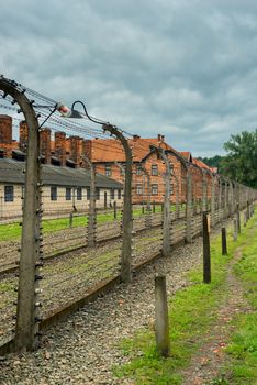 Auschwitz, Poland - August 12, 2017: death line in concentration camp wire with high voltage