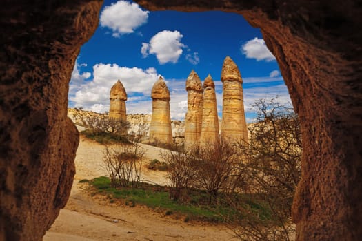 Cylindrical stone cliffs in valley named Love valley near Goreme, Turkey