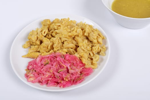 Whole-grain pasta with tofu on a white background