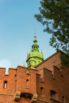 Krakow, Poland - August 14, 2017: Krakow, tower Wawel Castle on blue sky background