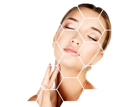 Pretty woman is touching her face, skin treatment concept.