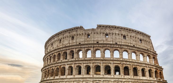 Ancient Roman Colosseum at sunrise. Rome, Italy