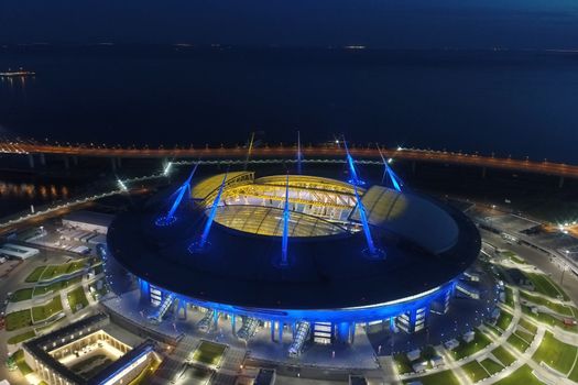 Stadium Zenith Arena at night. Illuminated by multi-colored lights the stadium at night