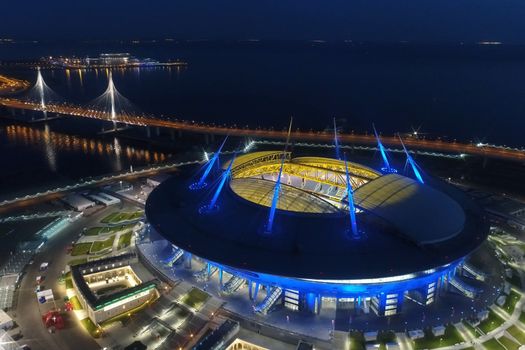 Stadium Zenith Arena at night. Illuminated by multi-colored lights the stadium at night