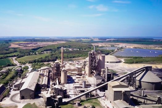 Large cement plant. The production of cement on an industrial scale in the factory.