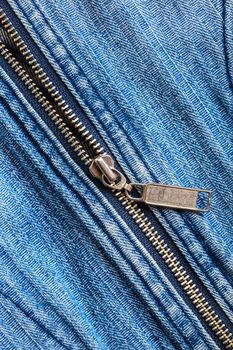 abstract background from a denim and a zipper texture