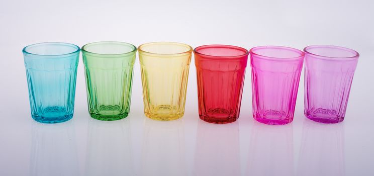 Drinking glasses of various color with patterns