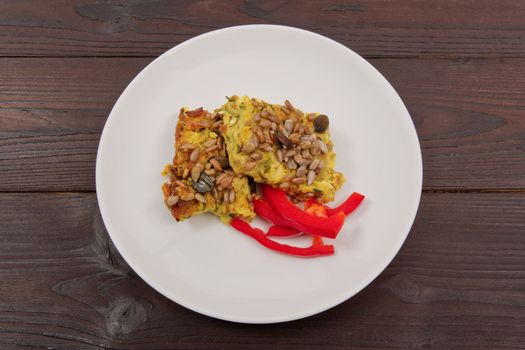 Azuki with vegetables on steam on a wooden table