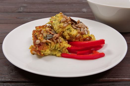 Azuki with vegetables on steam on a wooden table