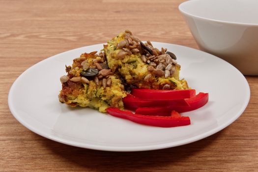 Azuki with vegetables on steam on a wooden table