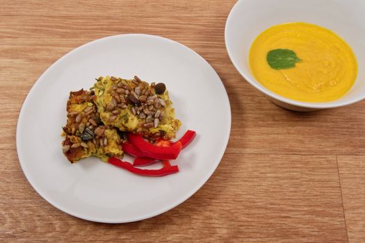 Azuki with vegetables on steam on a wooden table