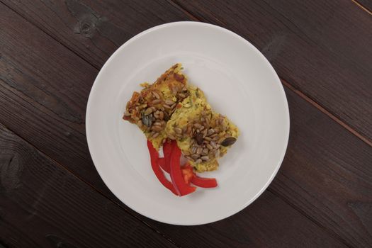 Azuki with vegetables on steam on a wooden table