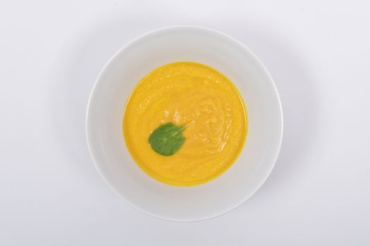 Miso vegetable soup with vegetables on a white background