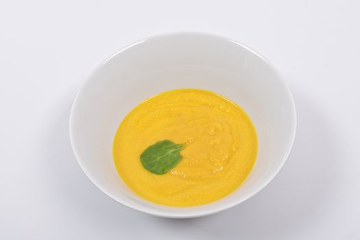 Miso vegetable soup with vegetables on a white background