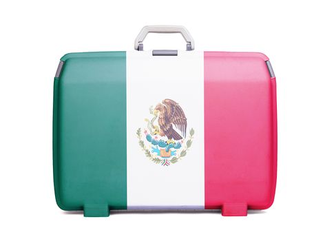 Used plastic suitcase with stains and scratches, printed with sign, danger, cross