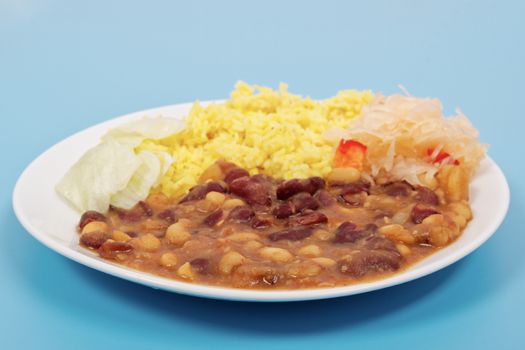 Red beans with curry rice on a blue background