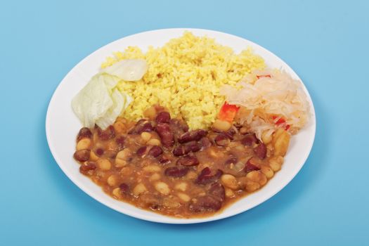 Red beans with curry rice on a blue background