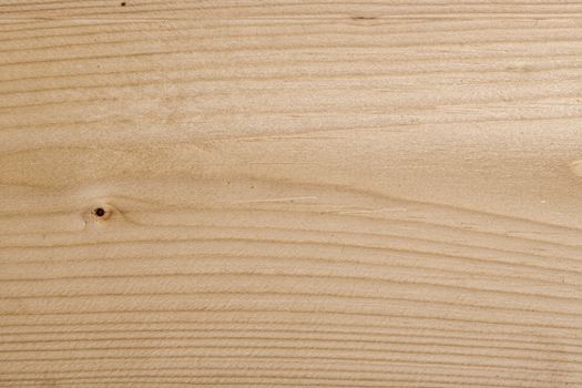 Wood texture with natural pattern. A fragment of a wooden panel