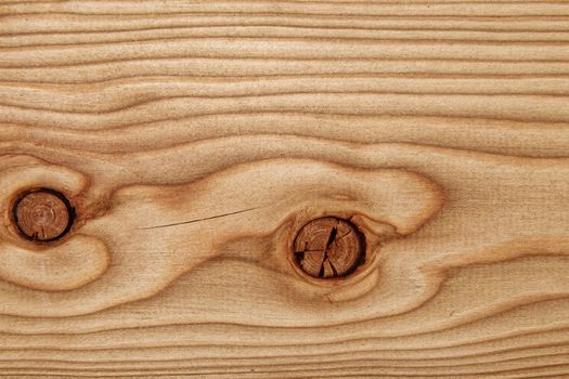Wood texture with natural pattern. A fragment of a wooden panel