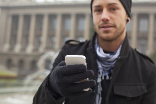 Traveling Man With Mobile Phone And Hat, In City, Urban Space