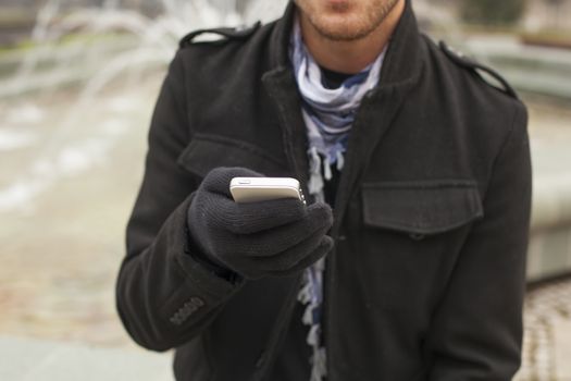 Traveling Man With Mobile Phone And Hat In City, Urban Space