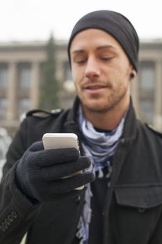 Traveling Man With Mobile Phone And Hat, In City, Urban Space