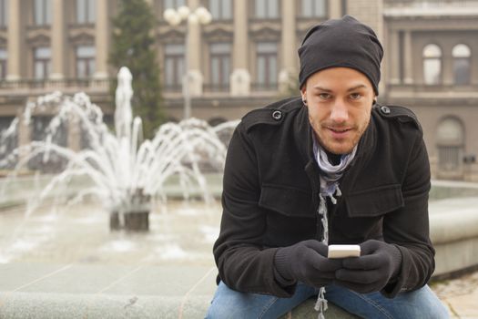 Young Man With Mobile Phone Outdoor