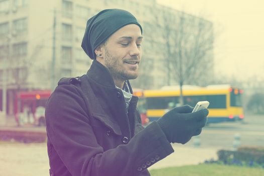 Traveling Man With Mobile Phone And Hat In City, Urban Space