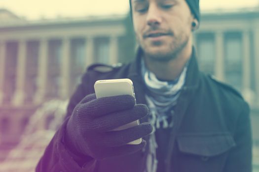 Traveling Man With Mobile Phone And Hat, In City, Urban Space