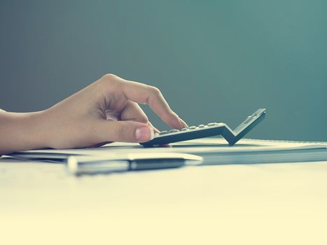 Market Analyze - pen and calculator on papers