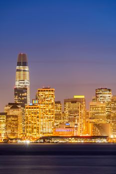 San Francisco downtown skyline at dusk from Treasure Island, California, sunset, USA.