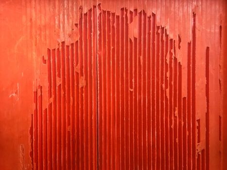 the old red plastic sheet breaking .abstract red background