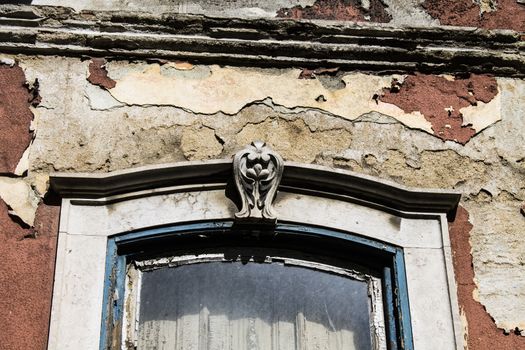 Ancient window in abandoned mansion the signs of time