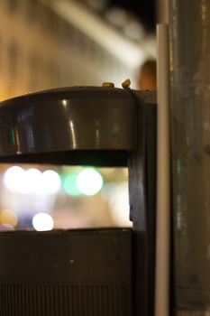 street ashtray in urban-degraded night time