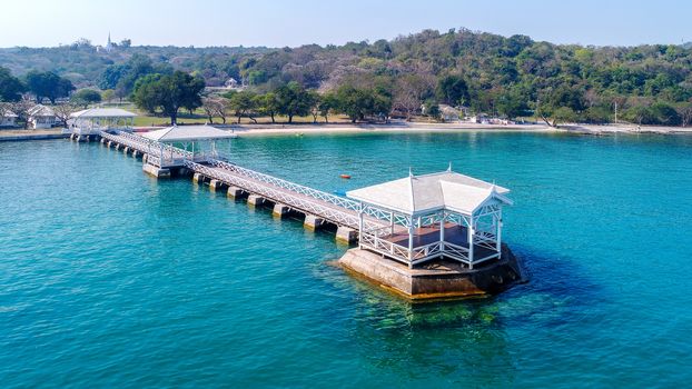 Aerial view of wood waterfront pavilion in Koh si chang island, Thailand. AsDang Bridge.