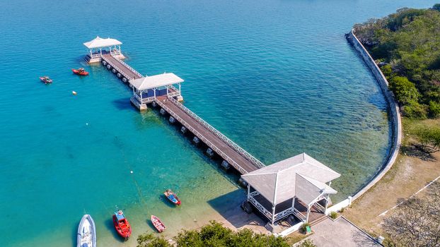 Aerial view of wood waterfront pavilion in Koh si chang island, Thailand. AsDang Bridge.