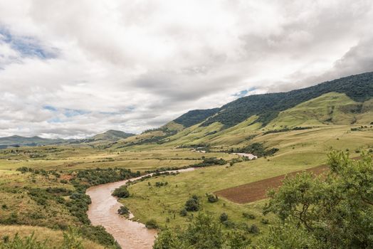 A mountain landscape with the Mkomazi River between Boston and Bulwer in the Kwazulu-Natal Province of South Africa