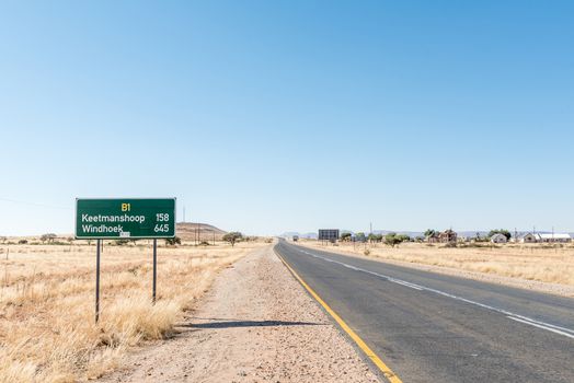 A distance sign on the B1-road at Grunau, a village in the Karas Region of Namibia
