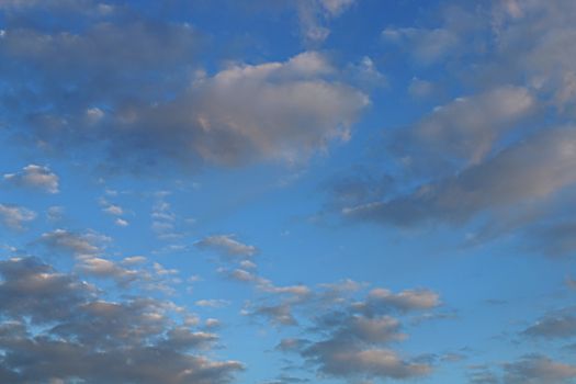 Blue sky background with tiny clouds, Clouds over blue sky in summer day, background.