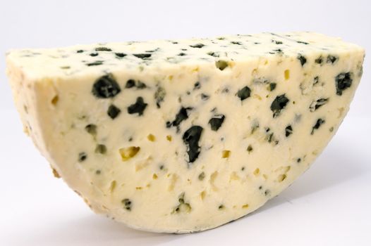 Half moon of Roquefort cheese from France on a white background